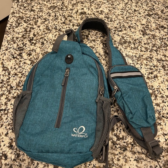 ⚡️FLASH SALE! WATERFLY Crossbody Teal Sling Backpack, Travel, Hiking - Picture 7 of 7